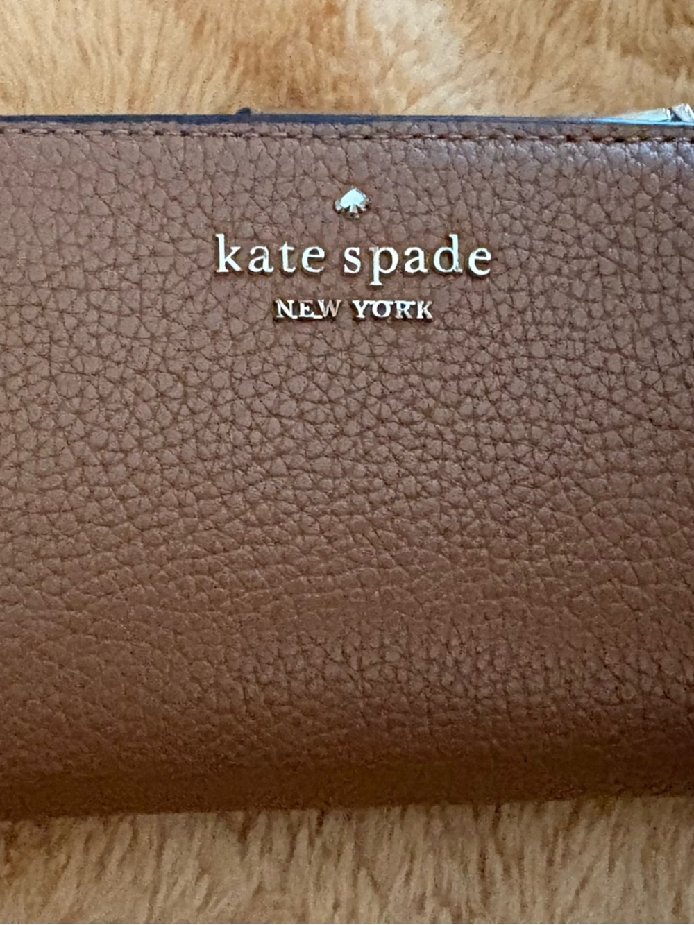 kate spade Brown Pebbled Leather Zip Wallet with Gold Logo